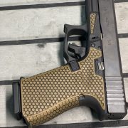 Glock 19 - G19 with cerakote, laser engraving, stippling. best custom gun shop.