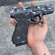 Glock 45 - G45 with digicam cerakote, laser engraving, stippling. best custom gun shop.