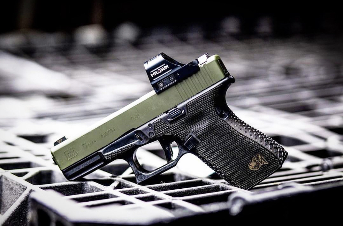 Glock 19- G19 with custom Cerakote, laser engraving, stippling. Best Custom Gun Shop.