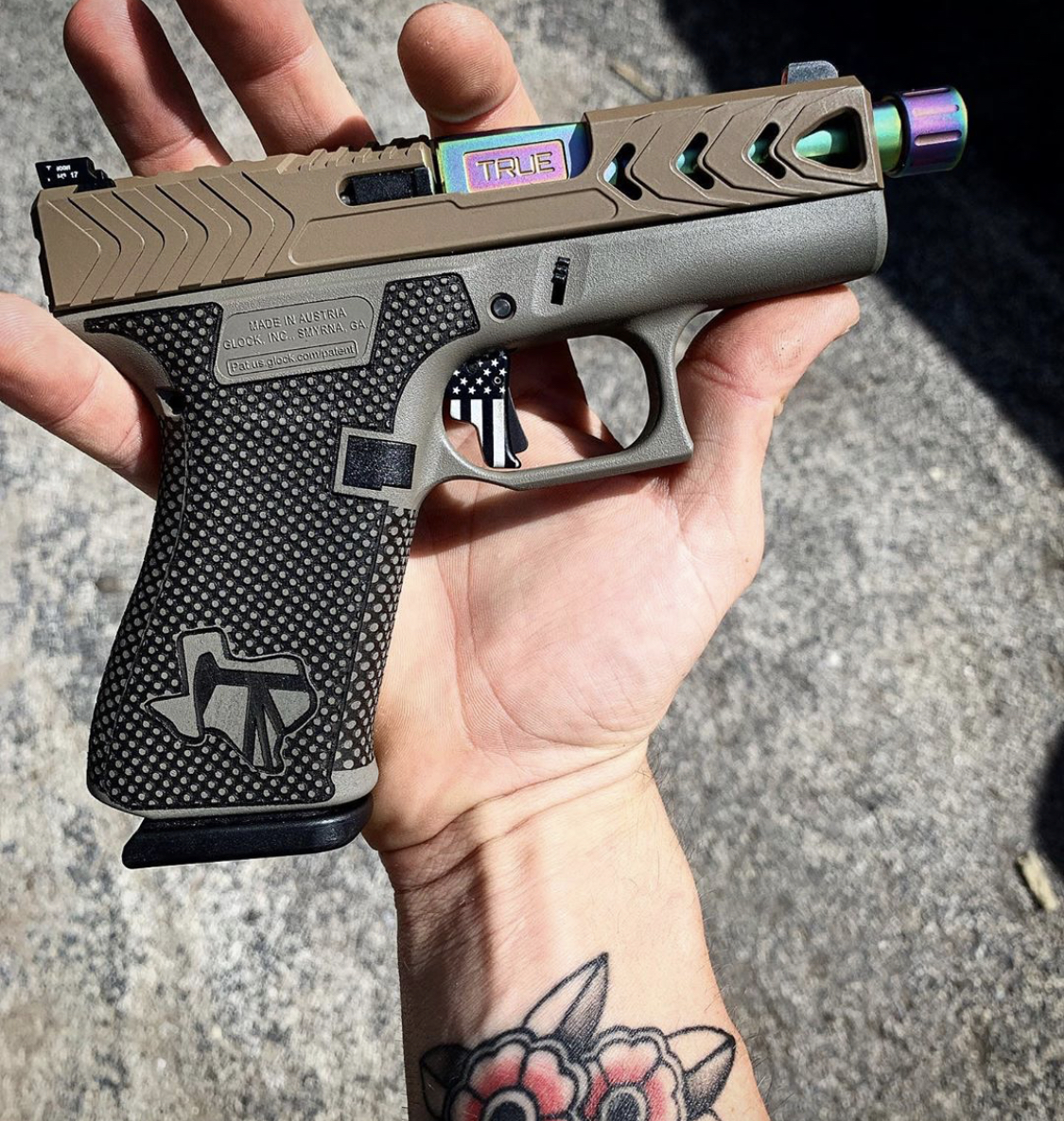 Glock 19 - G19 with custom Cerakote, laser engraving, stippling. Best Custom Gun Shop.