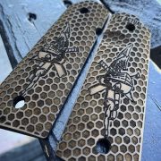 Custom 1911 grips. Custom engraving for recon sniper foundation.