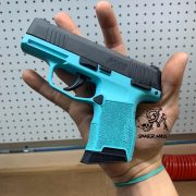 Sig sauer p365 Glock with custom Cerakote, laser engraving.