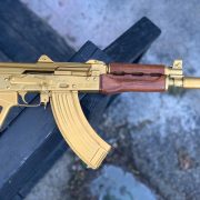 Gold Ak-47 with wood grip. Best custom gun shop.